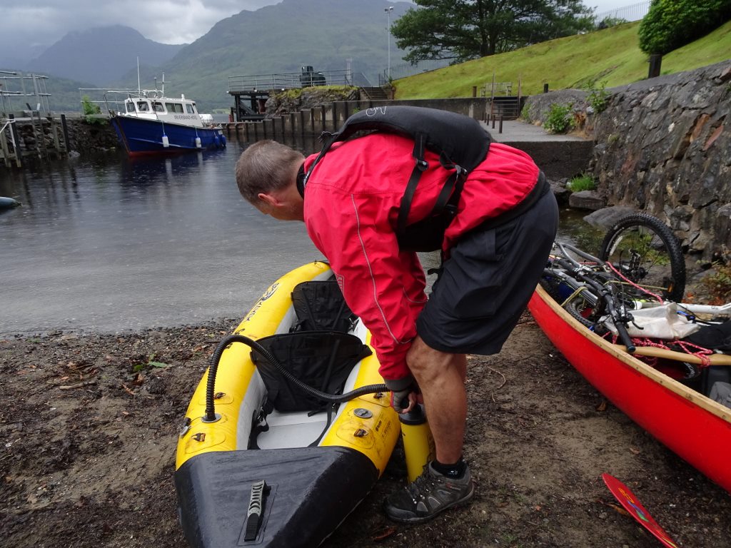 Loading bikes into the canoes at Inversnaid